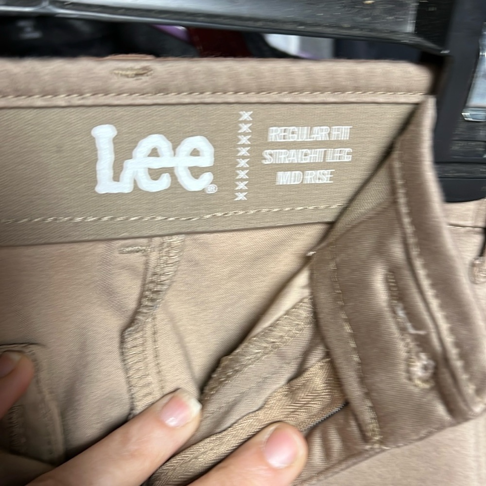woman’s slacks. slight scratch back of left knee